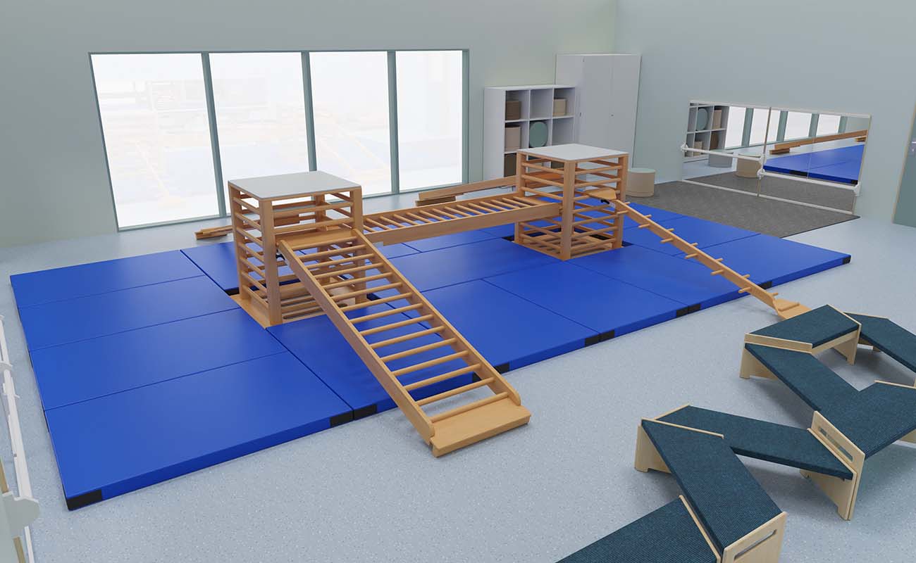 Bewegungsraum Bewegungsdschungel Ausschnitt mit Sprossenturm Active, weichen Bodenmatten, Betzold Trapezbänken zum Balancieren und eduCasa Spiegelwänden