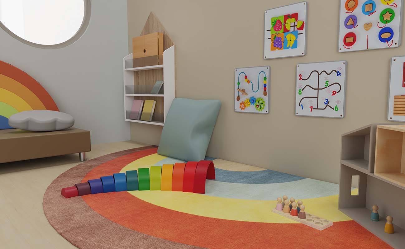 Spielecke Farbenzauber Ausschnitt mit Betzold Regenbogensofa, Regenbogenteppich, eduCasa Wandspielen und modularem Puppenhaus