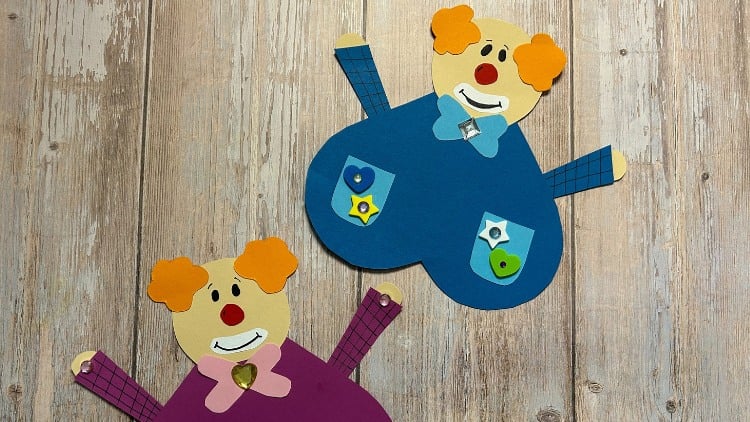 Aus Tonpapier schnell lustige Clowns basteln.