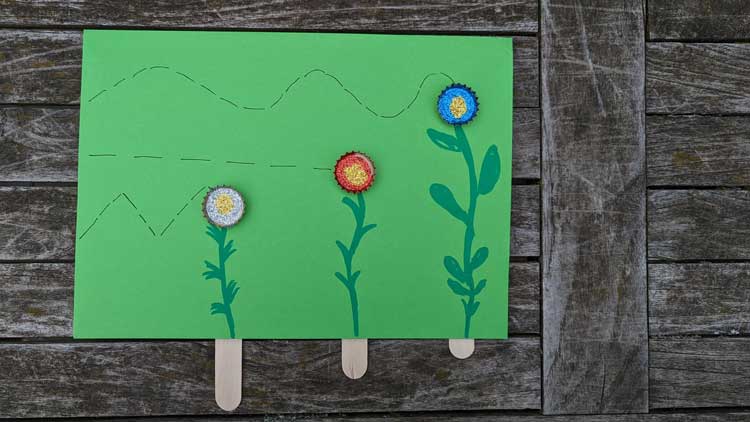 Das Thema Blumen kann im Kindergarten auch mit einem Magnetspiel umgesetzt werden.